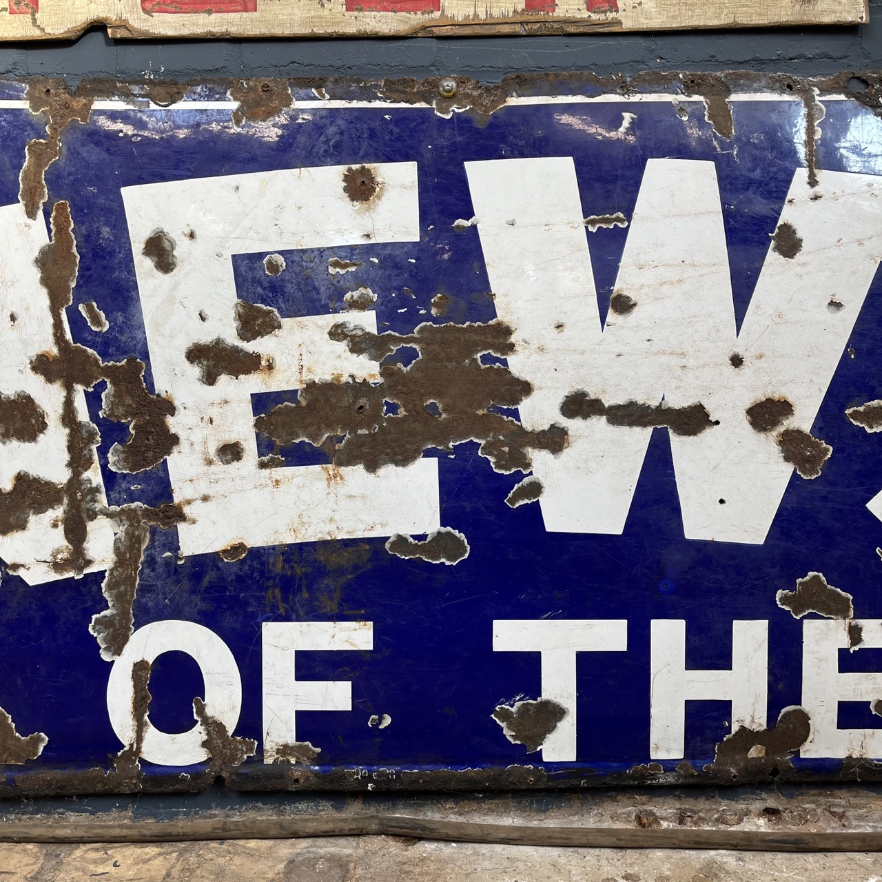 Enamel "NEWS OF THE"