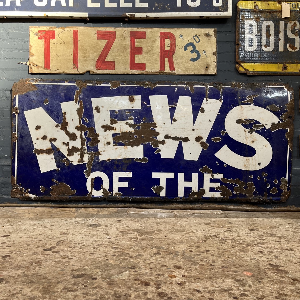 Enamel "NEWS OF THE"