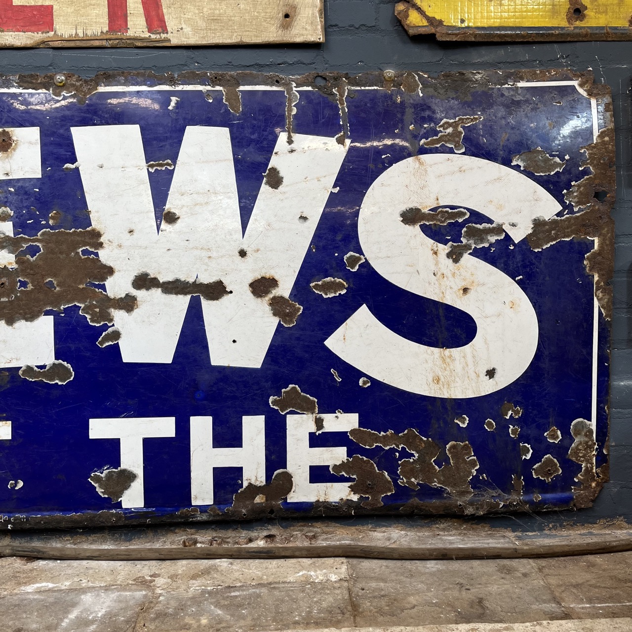 Enamel "NEWS OF THE"
